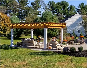12 x 16 Rustic Solace Pergola shown with Clear Stain/Sealer, Stainless Steel Hardware, 16" Top Runner Spacing, and Customer Supplied Lighting Kit.