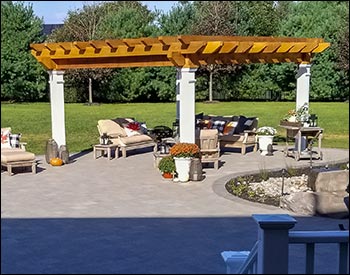 12 x 16 Rustic Solace Pergola shown with Clear Stain/Sealer, Stainless Steel Hardware, 16" Top Runner Spacing, and Customer Supplied Lighting Kit.