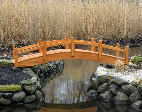 Custom 3 x 12 Single Rail Pedestrian Trail Bridge shown with Continuous Arch, Cedar Stain/Sealer, and 1 Extra Beam.